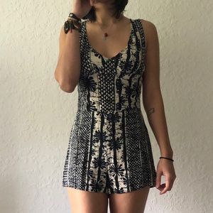 Beach or in house jumper with palms on it.